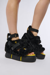 CRANBERRY CAGED BLACK FUZZY FLATFORM SANDAL