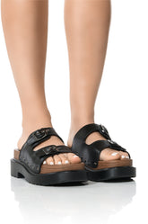 SLOW MOTION FLAT SANDAL IN BLACK