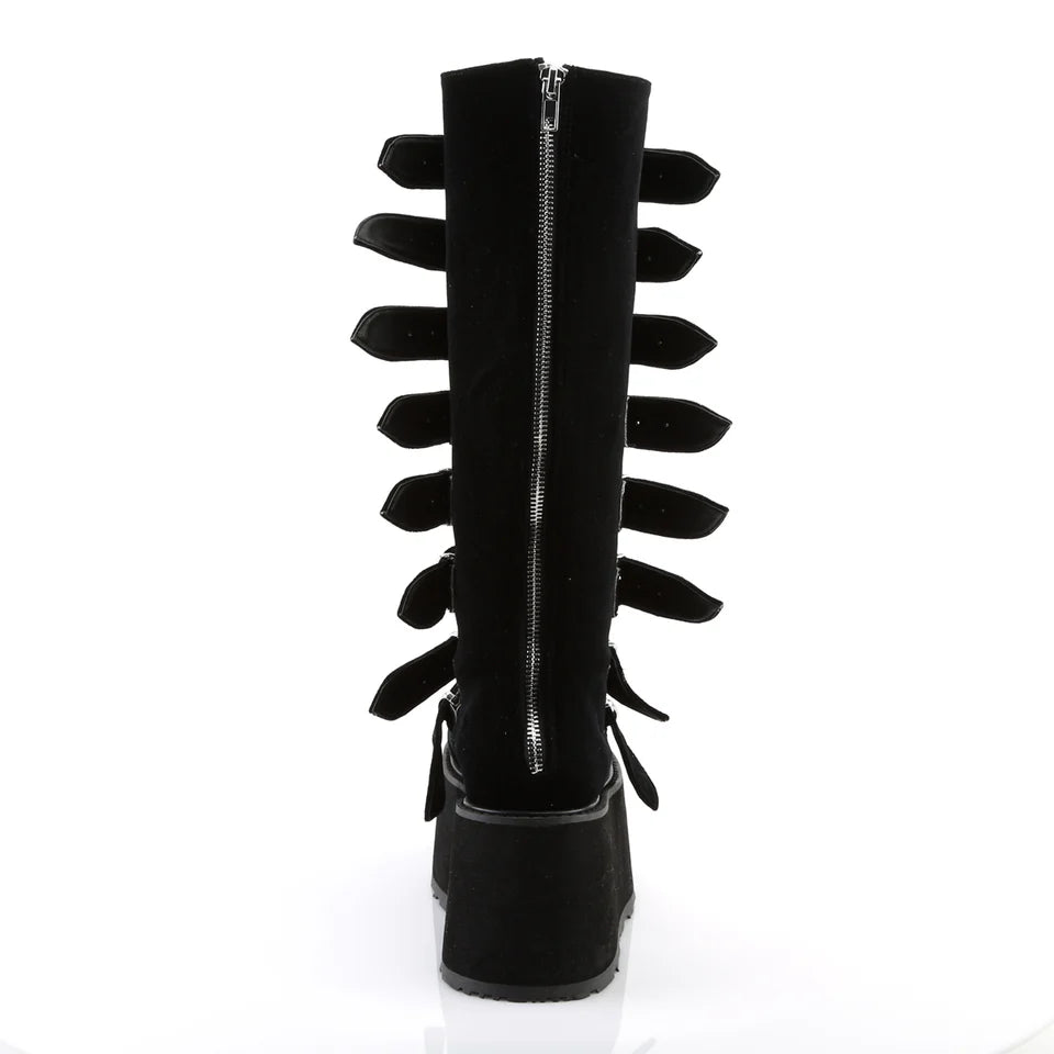 Gothic chic with space-age shimmer Damnedknee-high boots