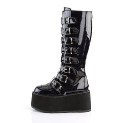 Gothic chic with space-age shimmer Damnedknee-high boots