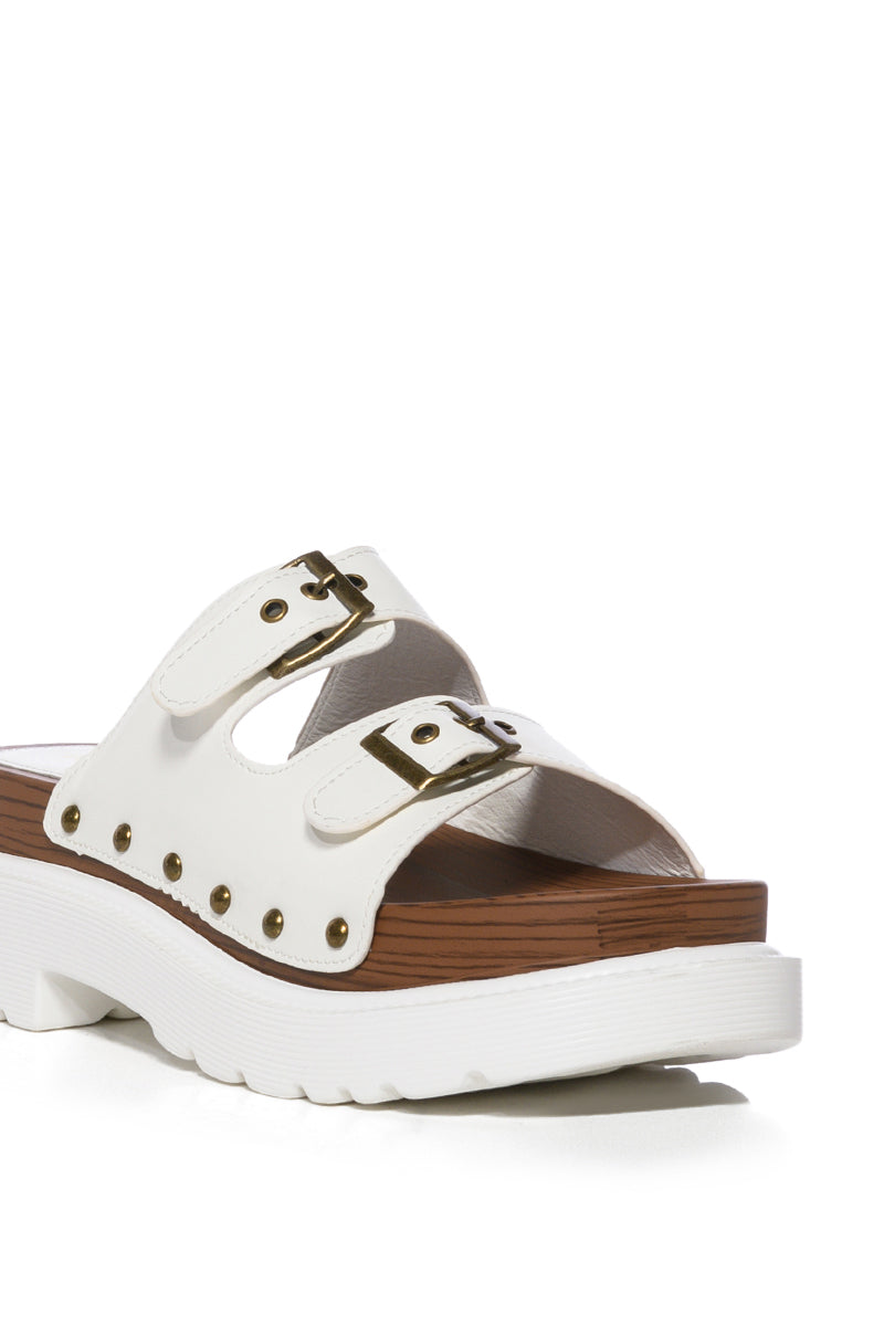 SLOW MOTION WHITE FLATFORM SANDAL